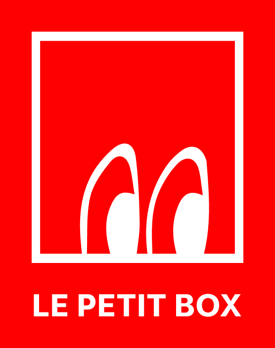 White Boxie outline and Le Petit Box wordmark on a bright red sticker